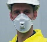 A construction worker wearing a protective facemask.
